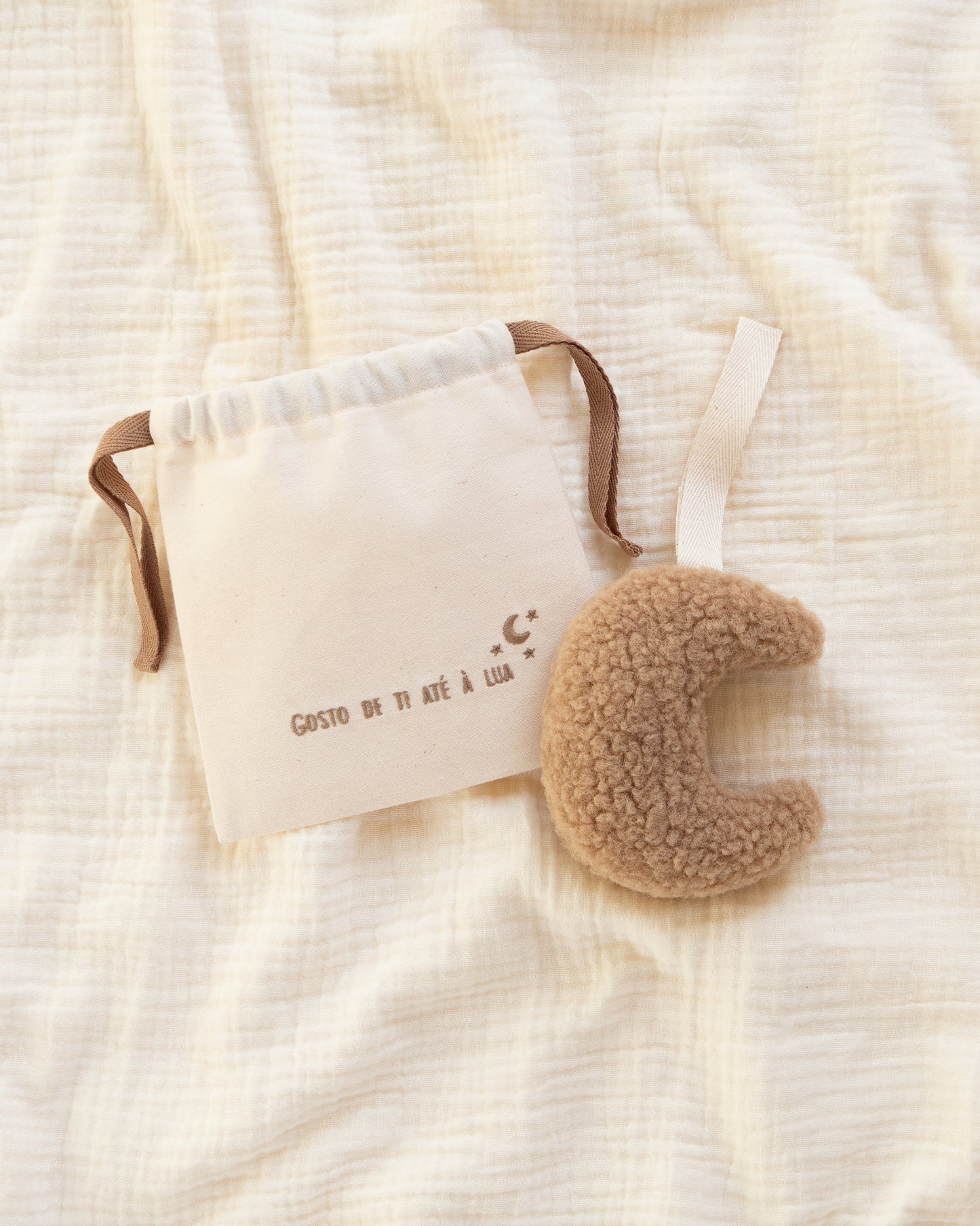 Lua carneirinho com guizo