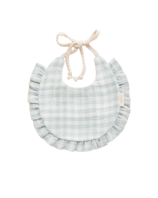 Babete impermeável em musselina com folhos